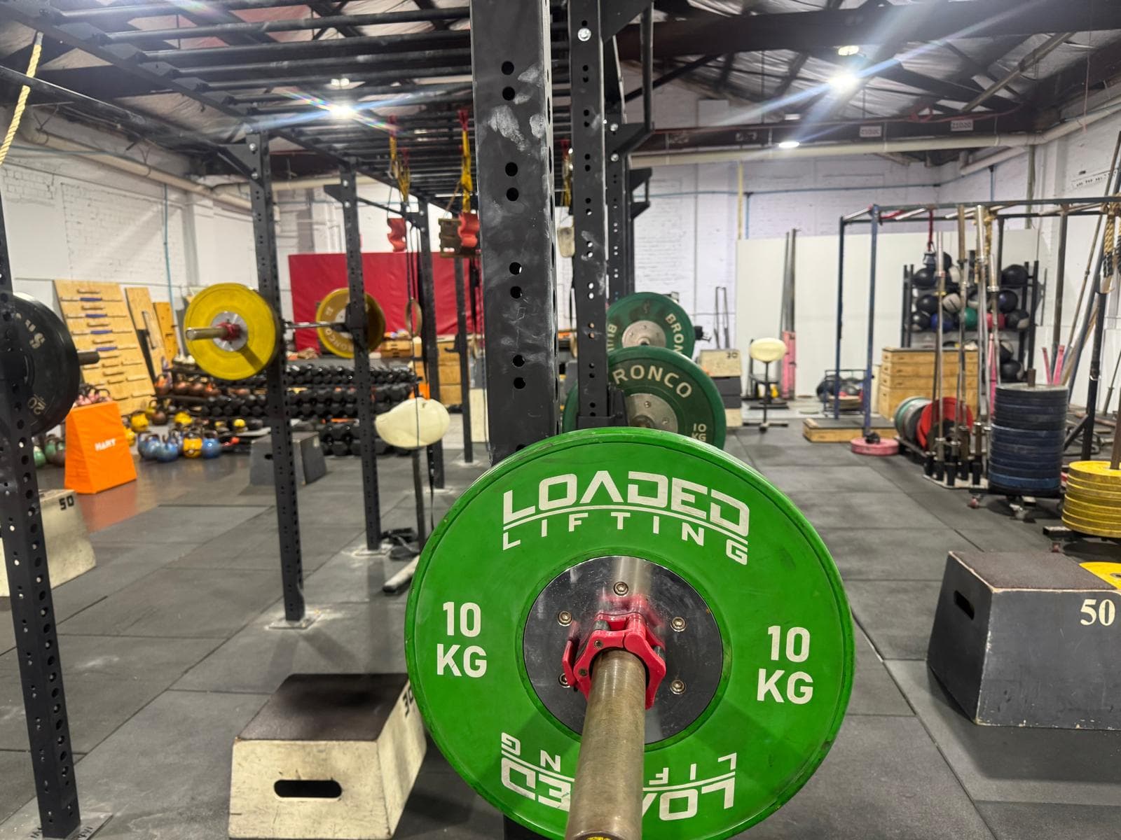 Close-up of a loaded barbell plate