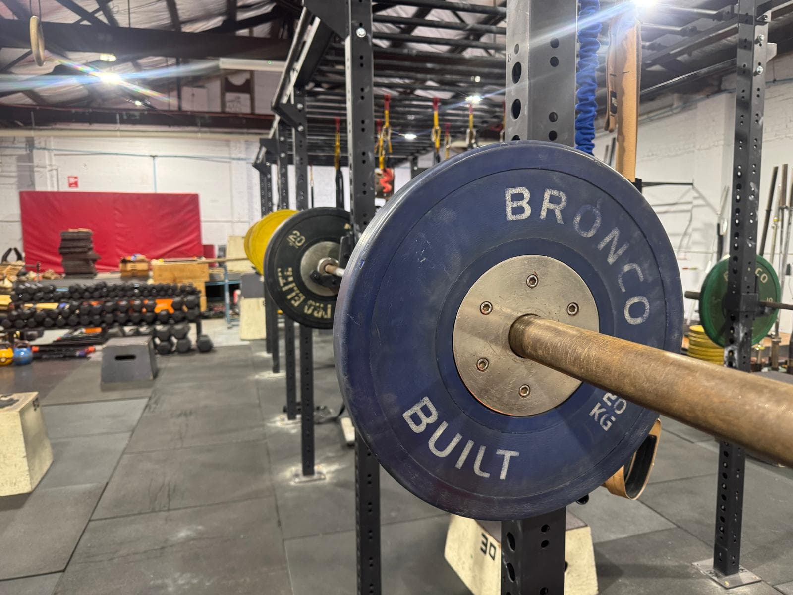Close-up of a loaded barbell plate